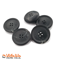 دکمه 4 سوراخ سایز 44 مشکی طرح ابر و باد(قیمت صحیح است و موجود می باشد)