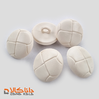 دکمه پایه دار سایز 31 کرمی(قیمت صحیح است و موجود می باشد)